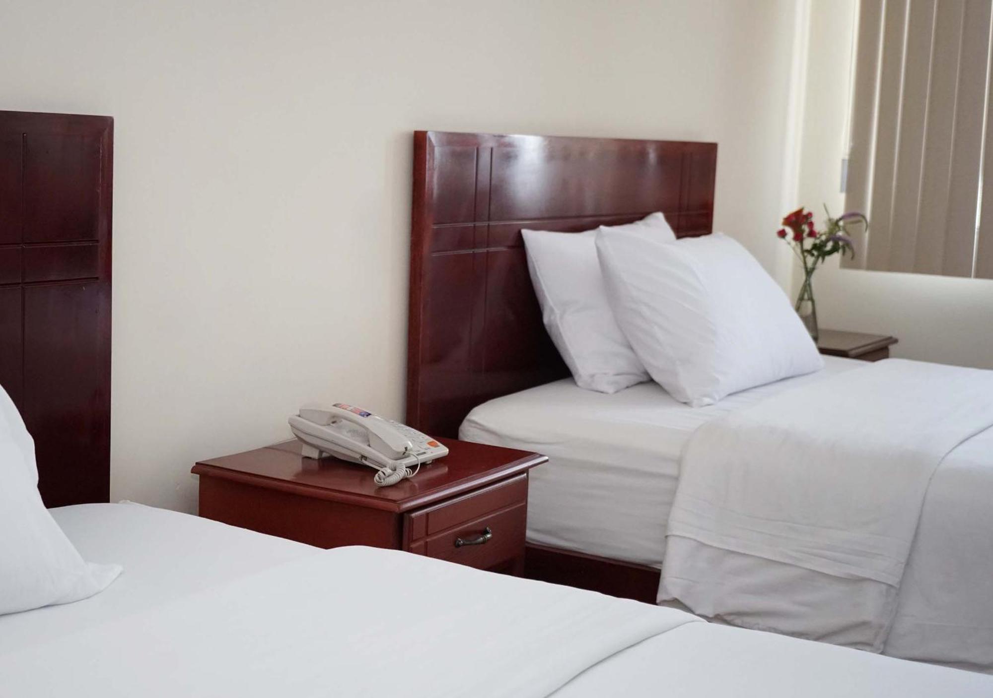 Hotel Lottus Quito Oda fotoğraf